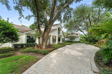 Nestled at the end of a quiet cul-de-sac on 1.15 acres within on Isleworth Golf and Country Club in Florida - for sale on GolfHomes.com, golf home, golf lot