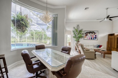Wonderful open floor plan built on cul-de-sac overlooking wide on PGA National Estates Golf Course in Florida - for sale on GolfHomes.com, golf home, golf lot