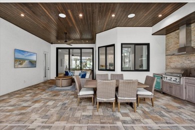 Luxuriously Modern Waterfront Masterpiece in Prestigious Punta on Saint Andrews South Golf Club in Florida - for sale on GolfHomes.com, golf home, golf lot
