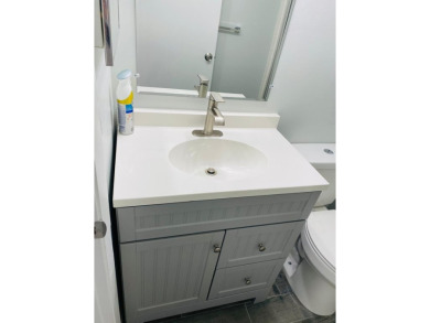 This beautifully remodeled corner unit offers serene views of on Boca Dunes Golf and Country Club in Florida - for sale on GolfHomes.com, golf home, golf lot