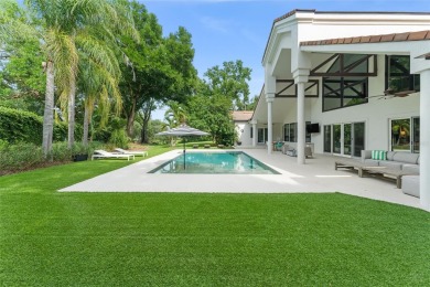 Nestled at the end of a quiet cul-de-sac on 1.15 acres within on Isleworth Golf and Country Club in Florida - for sale on GolfHomes.com, golf home, golf lot