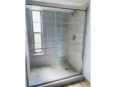 This beautifully remodeled corner unit offers serene views of on Boca Dunes Golf and Country Club in Florida - for sale on GolfHomes.com, golf home, golf lot