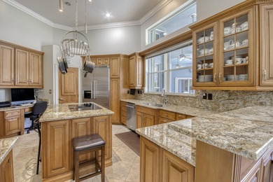 Wonderful open floor plan built on cul-de-sac overlooking wide on PGA National Estates Golf Course in Florida - for sale on GolfHomes.com, golf home, golf lot