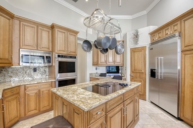 Wonderful open floor plan built on cul-de-sac overlooking wide on PGA National Estates Golf Course in Florida - for sale on GolfHomes.com, golf home, golf lot