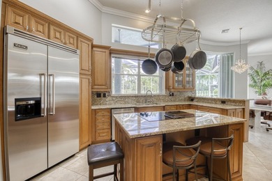 Wonderful open floor plan built on cul-de-sac overlooking wide on PGA National Estates Golf Course in Florida - for sale on GolfHomes.com, golf home, golf lot