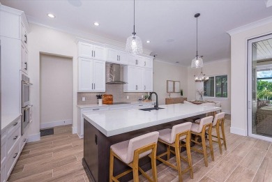 Luxuriously Modern Waterfront Masterpiece in Prestigious Punta on Saint Andrews South Golf Club in Florida - for sale on GolfHomes.com, golf home, golf lot