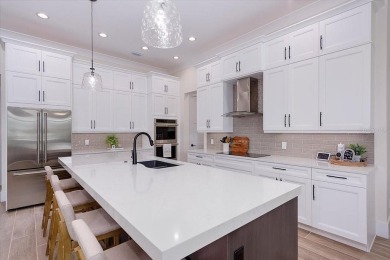 Luxuriously Modern Waterfront Masterpiece in Prestigious Punta on Saint Andrews South Golf Club in Florida - for sale on GolfHomes.com, golf home, golf lot