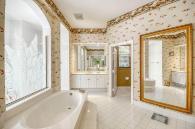 Wonderful open floor plan built on cul-de-sac overlooking wide on PGA National Estates Golf Course in Florida - for sale on GolfHomes.com, golf home, golf lot