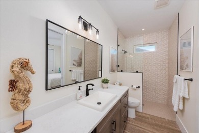 Luxuriously Modern Waterfront Masterpiece in Prestigious Punta on Saint Andrews South Golf Club in Florida - for sale on GolfHomes.com, golf home, golf lot
