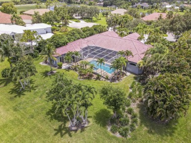 Wonderful open floor plan built on cul-de-sac overlooking wide on PGA National Estates Golf Course in Florida - for sale on GolfHomes.com, golf home, golf lot