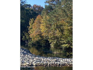 Nestled within one of the area's most prestigious gated on Members Club At St. James Plantation in North Carolina - for sale on GolfHomes.com, golf home, golf lot