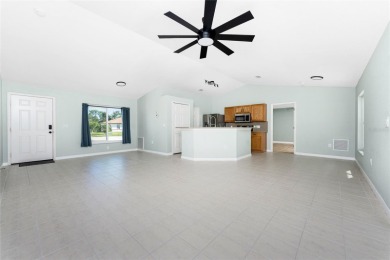 Welcome to this beautifully updated 3-bed, 2-bath pool home with on Duffys Golf Center in Florida - for sale on GolfHomes.com, golf home, golf lot