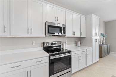 Experience unparalleled living in this exquisite top-floor on Heritage Landing Golf  in Florida - for sale on GolfHomes.com, golf home, golf lot