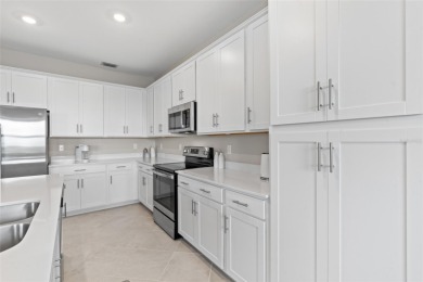 Experience unparalleled living in this exquisite top-floor on Heritage Landing Golf  in Florida - for sale on GolfHomes.com, golf home, golf lot