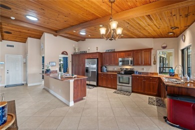 Better Than New! Designer-Renovated Pool Home with Canal Views on El Rio Golf Course and Club in Florida - for sale on GolfHomes.com, golf home, golf lot
