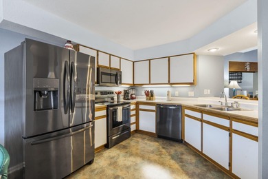 Penthouse condo with high vaulted ceilings and panoramic views on Pointe Royale Village Country Club in Missouri - for sale on GolfHomes.com, golf home, golf lot