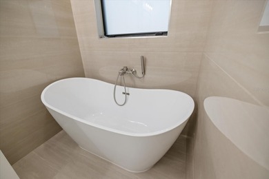 QUALITY MATTERS! STUNNING BRAND-NEW 2025 modern luxury 3-bedrom on Rotonda Golf and Country Club The Palms Course in Florida - for sale on GolfHomes.com, golf home, golf lot