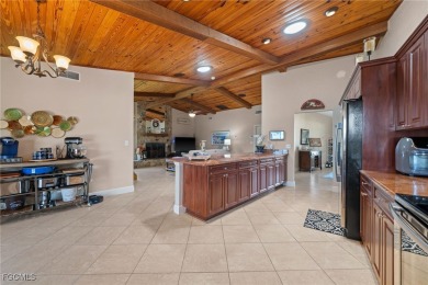 Better Than New! Designer-Renovated Pool Home with Canal Views on El Rio Golf Course and Club in Florida - for sale on GolfHomes.com, golf home, golf lot