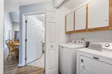 Penthouse condo with high vaulted ceilings and panoramic views on Pointe Royale Village Country Club in Missouri - for sale on GolfHomes.com, golf home, golf lot