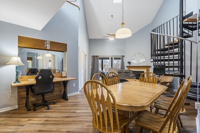 Penthouse condo with high vaulted ceilings and panoramic views on Pointe Royale Village Country Club in Missouri - for sale on GolfHomes.com, golf home, golf lot