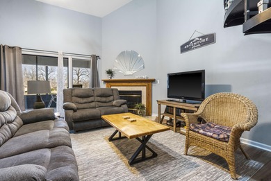 Penthouse condo with high vaulted ceilings and panoramic views on Pointe Royale Village Country Club in Missouri - for sale on GolfHomes.com, golf home, golf lot