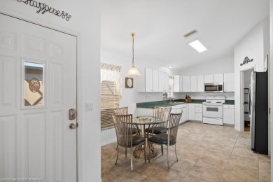 Beautiful furnished Condo Three bedroom, 2 baths, 2 car garage on Spring Lake Golf Resort in Florida - for sale on GolfHomes.com, golf home, golf lot