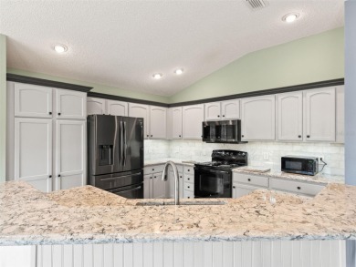 Welcome to The Villages lifestyle at its finest! This stunning 3 on The Links of Spruce Creek in Florida - for sale on GolfHomes.com, golf home, golf lot