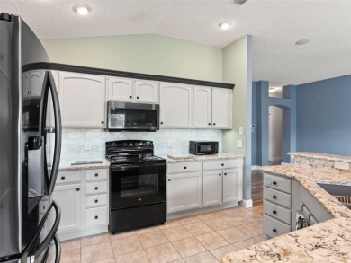 Welcome to The Villages lifestyle at its finest! This stunning 3 on The Links of Spruce Creek in Florida - for sale on GolfHomes.com, golf home, golf lot