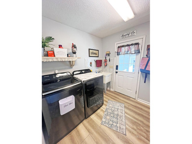 Stunning Custom Home with Deeded Boat Slip in Wyboo Plantation on Players Course At Wyboo Plantation in South Carolina - for sale on GolfHomes.com, golf home, golf lot