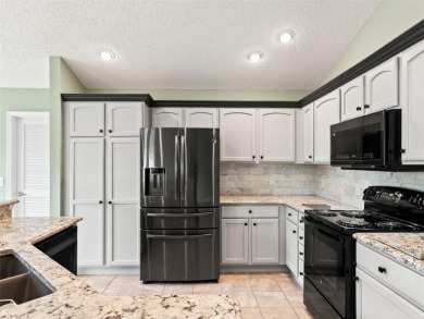 Welcome to The Villages lifestyle at its finest! This stunning 3 on The Links of Spruce Creek in Florida - for sale on GolfHomes.com, golf home, golf lot