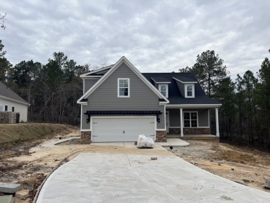 Welcome to 325 Whithorn Court, a stunning custom home crafted by on The Golf Club At Cedar Creek in South Carolina - for sale on GolfHomes.com, golf home, golf lot