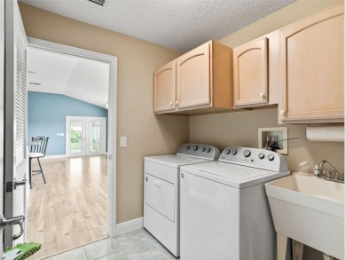 Welcome to The Villages lifestyle at its finest! This stunning 3 on The Links of Spruce Creek in Florida - for sale on GolfHomes.com, golf home, golf lot