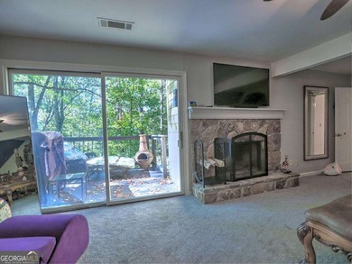 Secluded Forest Retreat in Rivermont Country Club. Tucked at the on Rivermont Golf and Country Club in Georgia - for sale on GolfHomes.com, golf home, golf lot