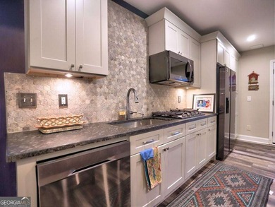 Secluded Forest Retreat in Rivermont Country Club. Tucked at the on Rivermont Golf and Country Club in Georgia - for sale on GolfHomes.com, golf home, golf lot