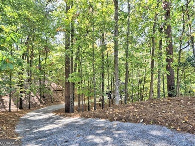 Secluded Forest Retreat in Rivermont Country Club. Tucked at the on Rivermont Golf and Country Club in Georgia - for sale on GolfHomes.com, golf home, golf lot