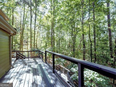 Secluded Forest Retreat in Rivermont Country Club. Tucked at the on Rivermont Golf and Country Club in Georgia - for sale on GolfHomes.com, golf home, golf lot