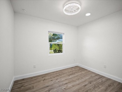 Charming 3-bedroom, 2-bathroom home nestled in the heart of Port on Port Charlotte Golf Club in Florida - for sale on GolfHomes.com, golf home, golf lot