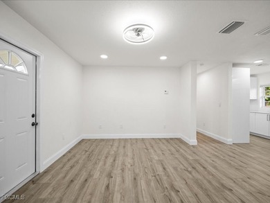 Charming 3-bedroom, 2-bathroom home nestled in the heart of Port on Port Charlotte Golf Club in Florida - for sale on GolfHomes.com, golf home, golf lot