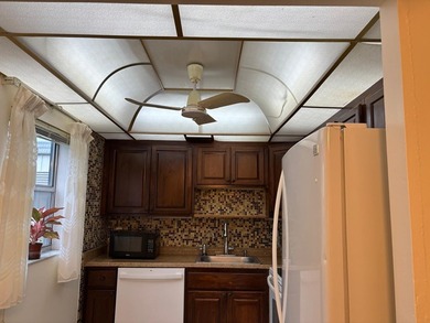 Welcome to this beautifully maintained 2-bedroom, 2-bath condo on Kings Point Golf - Executive in Florida - for sale on GolfHomes.com, golf home, golf lot