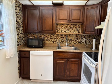 Welcome to this beautifully maintained 2-bedroom, 2-bath condo on Kings Point Golf - Executive in Florida - for sale on GolfHomes.com, golf home, golf lot