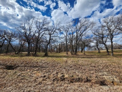 Golfers paradise, beautiful build site on hole 16 on golf course on Nocona Hills Golf Course in Texas - for sale on GolfHomes.com, golf home, golf lot