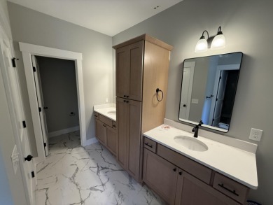 Welcome home to this brand new Andrew Ulberg Builders ranch in on Canadian Lakes Country Club-The Royal Course in Michigan - for sale on GolfHomes.com, golf home, golf lot