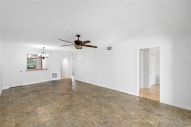 Effortless living starts here! Attractive ground-floor unit on Bayou Golf Club in Florida - for sale on GolfHomes.com, golf home, golf lot