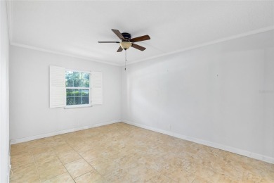 Effortless living starts here! Attractive ground-floor unit on Bayou Golf Club in Florida - for sale on GolfHomes.com, golf home, golf lot
