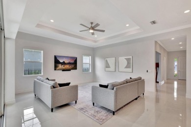 This beautiful welcoming home with 3-bedroom suites, office on PGA National Estates Golf Course in Florida - for sale on GolfHomes.com, golf home, golf lot