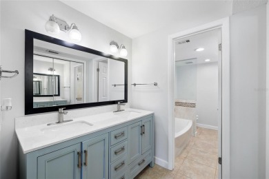 Effortless living starts here! Attractive ground-floor unit on Bayou Golf Club in Florida - for sale on GolfHomes.com, golf home, golf lot