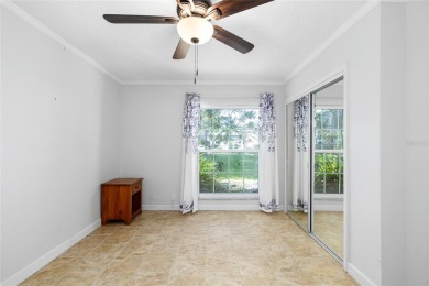 Effortless living starts here! Attractive ground-floor unit on Bayou Golf Club in Florida - for sale on GolfHomes.com, golf home, golf lot