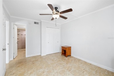 Effortless living starts here! Attractive ground-floor unit on Bayou Golf Club in Florida - for sale on GolfHomes.com, golf home, golf lot