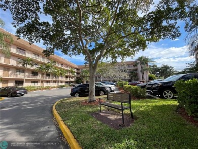 Beautifully Updated Corner Unit. Open Concept Kitchen styled in on Sunrise Lakes Phase IV Golf Course in Florida - for sale on GolfHomes.com, golf home, golf lot