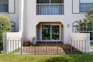 Effortless living starts here! Attractive ground-floor unit on Bayou Golf Club in Florida - for sale on GolfHomes.com, golf home, golf lot